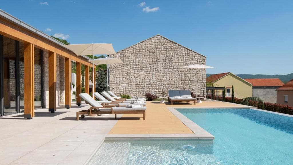 Infinity pool and loungers at the Croatia private villa retreat