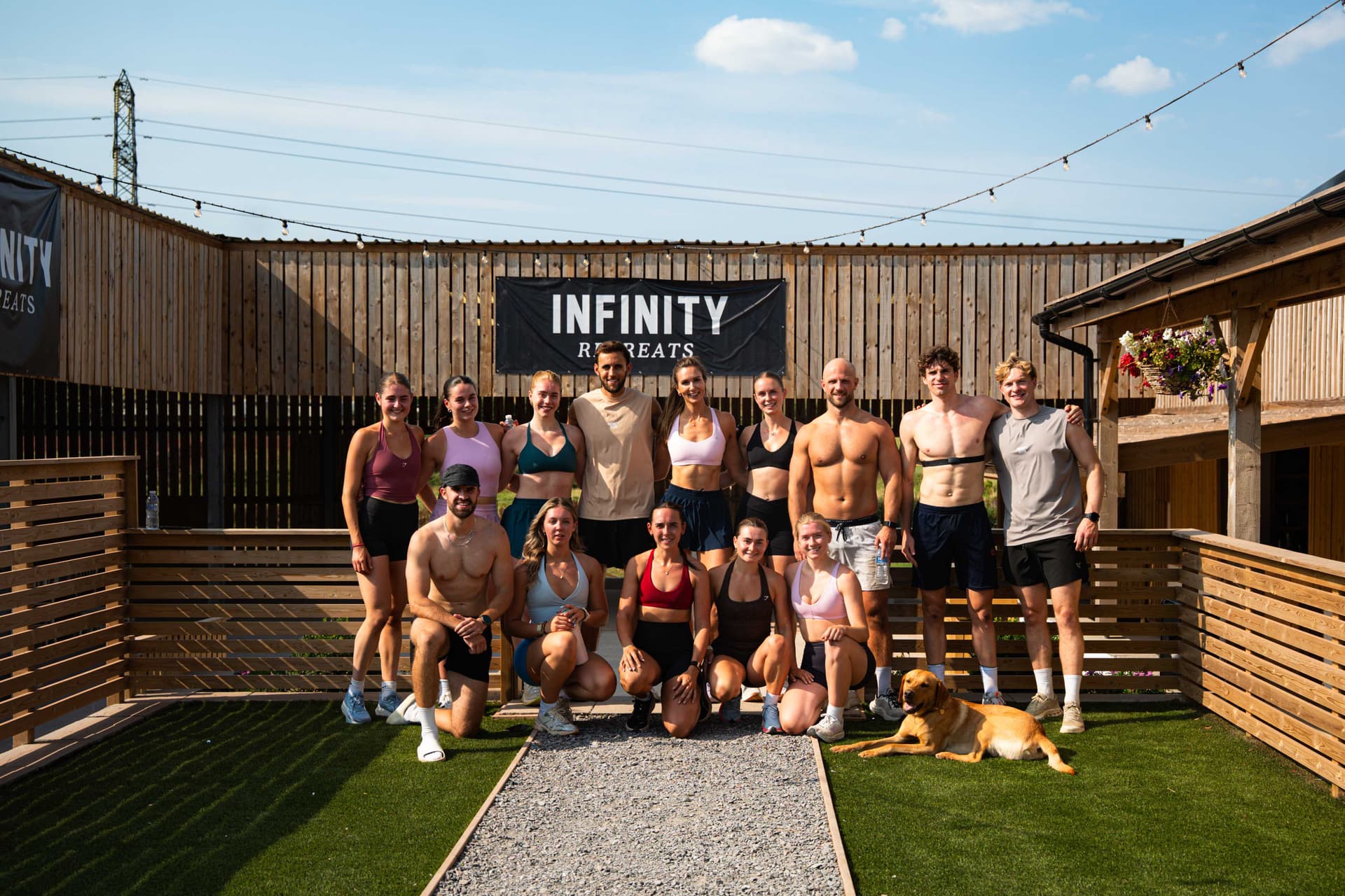 The Infinity Retreats group posed together at the Devon barn